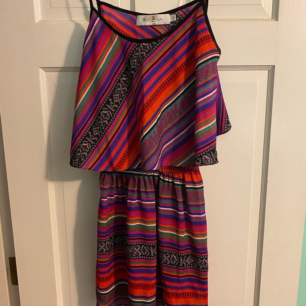 Size S boutique mini dress with open back